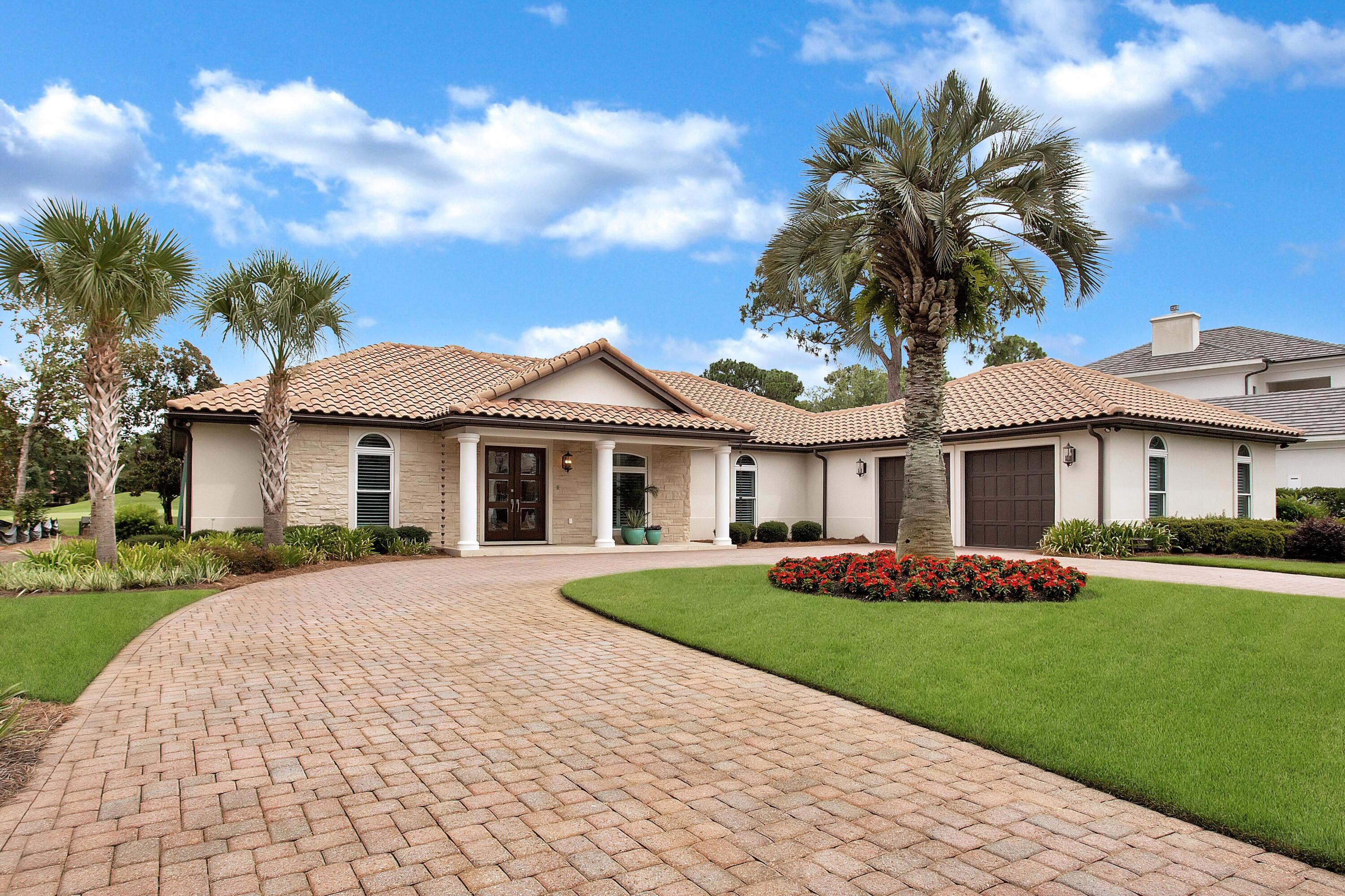 Modern opulence awaits behind the doors of this 3-bedroom home perfectly situated within the gates of the prestigious Burnt Pine at Sandestin. Upon entering through the double doors, you are greeted with 12-foot ceilings, finely appointed furnishings, & breathtaking views of the 12th green of the Burnt Pine Golf Course. Gather around the large quartz island in the timeless chef's kitchen, fully equipped with GE Cafe appliances, a GE Monogram Hood, a Marvel wine fridge, Mouser Alderwood cabinets, and ample space for storage. Retreat to the Primary Suite where you will find that each piece has been handpicked to exude modern elegance and comfort. The Primary Bathroom encompasses sophistication with quartz countertops, porcelain tile, a double vanity, glass walk-in shower, and dressing area.