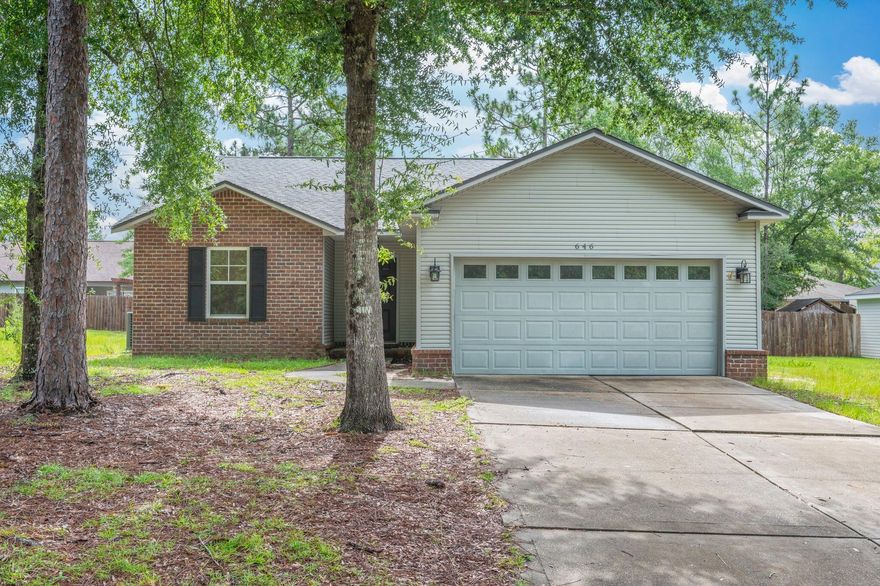Available June 13th --this beautifully maintained 3-bedroom, 2-bath home in the private and peaceful Hunter's Ridge neighborhood offers comfort, space, and convenience all in one. Featuring 1,466 square feet, the home boasts a split floor plan, vaulted ceilings, and brand-new waterproof LVP flooring throughout. The open living, dining, and kitchen area includes a center island, pantry, and plenty of counter space--perfect for everyday living and entertaining. Enjoy a spacious covered back porch overlooking the backyard, ideal for relaxing or outdoor meals. The primary suite includes a walk-in closet and double vanity, and there's a large two-car garage and separate utility room for added convenience. Located just minutes from schools, shopping, and downtown DeFuniak Springs.