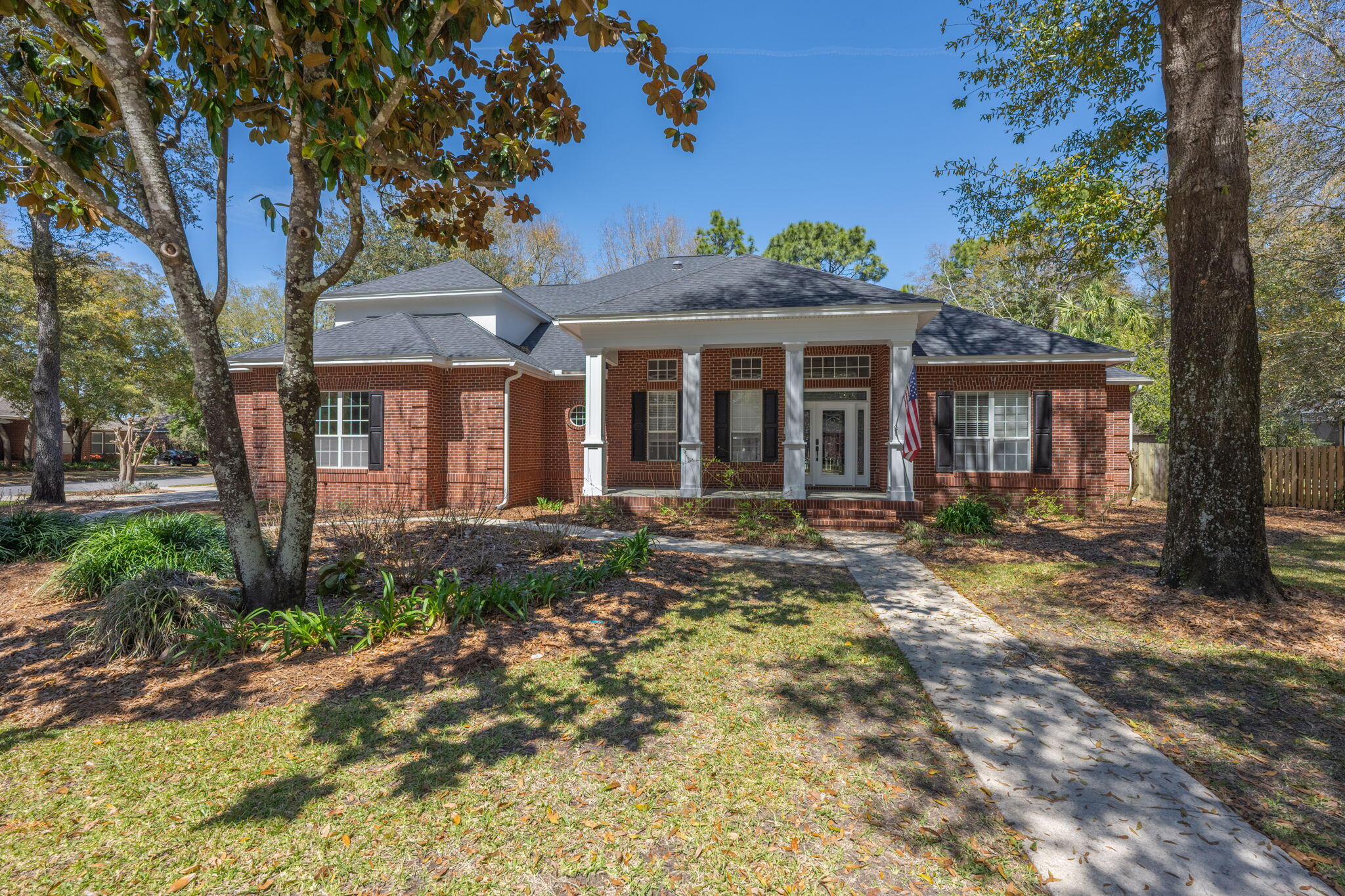 Welcome to 270 Sweetwater Run, one of the largest homes in sought-after Swift Creek in Niceville, FL! This spacious 5BR/4.5BA home features nearly 4,000 sq ft of comfort, including an office, formal dining room, butler's pantry, chef's kitchen with granite counters, island sink, custom cabinets, and soaring 13' coffered ceilings. Enjoy hardwood-style floors throughout, a huge laundry room, screened Florida room, and outdoor brick fireplace. Bedrooms are oversized, each with an attached bath. Corner lot with included lawn care. Community pool and trails nearby. Zoned for Edge Elementary. Dogs (max 2) with deposit. 1-year lease preferred. Tenants cover utilities. Privately managed.
