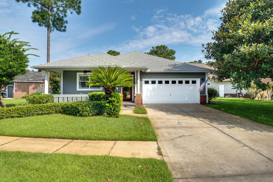 You don't want to miss this gem in popular Escada! Great curb appeal, lakefront and move-in ready! It's cute as can be! Open concept floor plan, three bedrooms, two baths, two-car garage, fenced backyard, large screened porch. Seller has made numerous upgrades including a master bath remodel, now featuring marble floors, large glassed walk-in shower with rain shower head, body spray and designer vessel sinks, new lighting fixtures and ceiling fans, ceiling medallions, new carpet, interior and exterior paint, stainless appliances, electrical wiring and electrical panel, HVAC, screened porch, garage door mechanics, Rainbird irrigation system. Additional features include a large kitchen with plenty of counter and cabinet space, walk-in pantry, bamboo floors in living room, huge walk-in