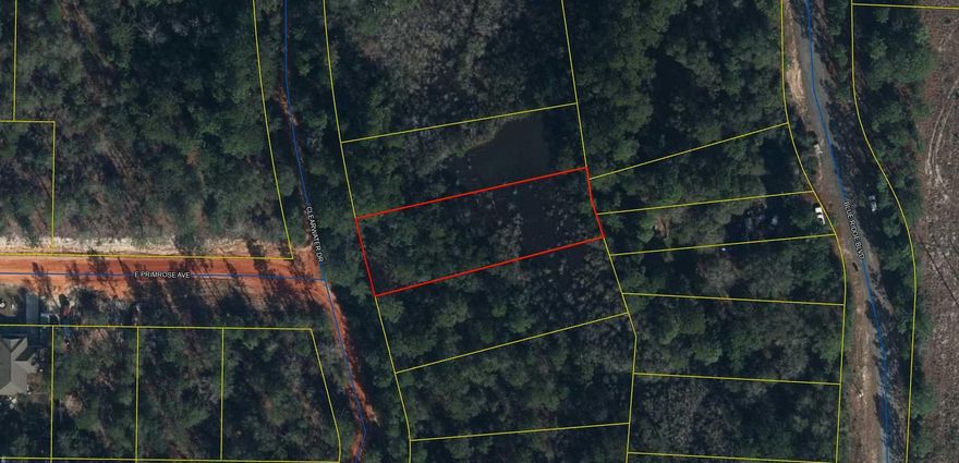Wooded lot in a central location between DeFuniak Springs and Crestview. This lot allows manufactured homes and mobile homes. All measurements to be verified by buyer.