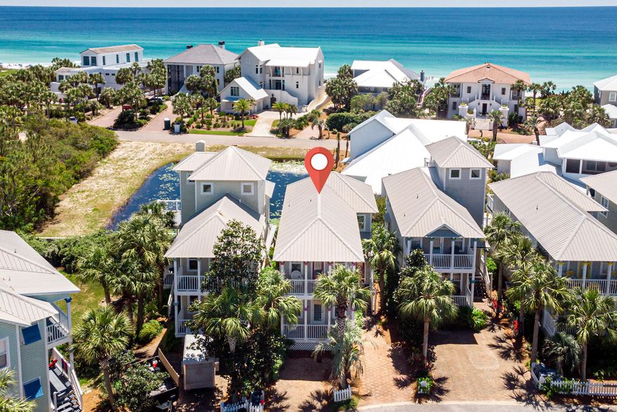 SOUTH of 30A 3 bedroom home UNDER $1M... and it has Gulf views! Located in the charming neighborhood of Old Florida Cottages, you can enjoy a short walk to the community heated pool, or the public beach access at Gulfview Heights! Enjoy the 30a lifestyle as you walk or bike to local shopping & dining at Goatfeathers, Cafe Tango, Local Catch, Shunk Gulley or the Shops at Gulf Place. Each of the home's 3 bedrooms has it's own private balcony and it's own bath. The open concept reverse floor plan creates a great space for entertaining. From the second level enjoy views looking over a peaceful lilypad covered pond onto peeks of the Gulf. This will make an incredible rental or your next vacation home! This one won't last!