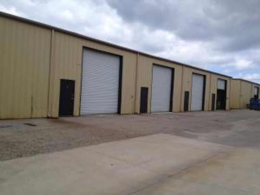 Warehouse has an office and restroom in the rear of the unit and in the front has a 16 foot high roll up door.