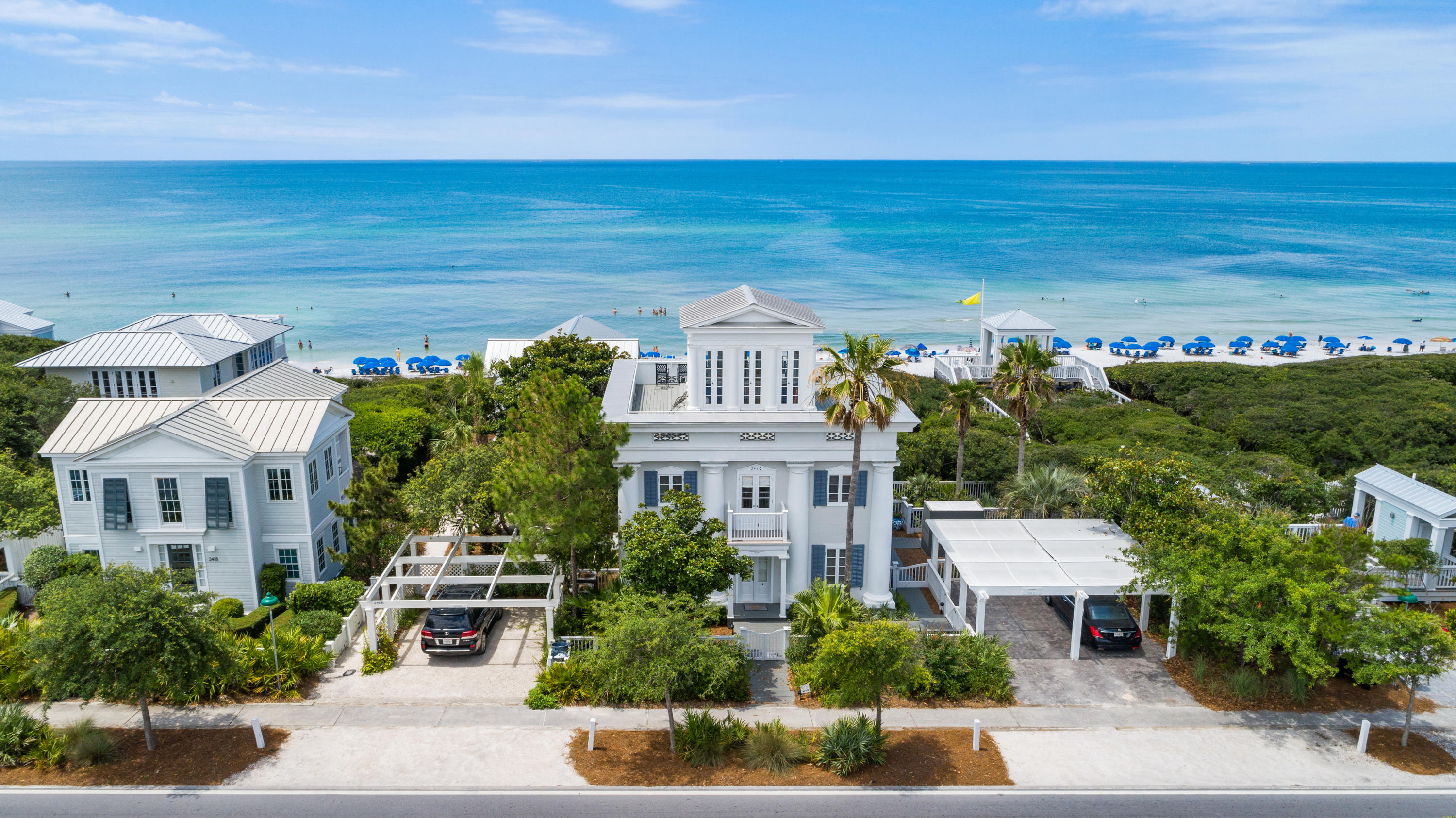 Enjoy unobstructed views of the Gulf of Mexico from this charming beach front home located in Seaside, FL! Property conveys with adjacent deed restricted beach front parcel, ensuring forever gulf views and privacy. This wonderful coastal residence has 3 bedrooms, 3 baths and a tower with a wrap around porch that has views of both the beach and the town of Seaside. The 2nd floor living area is spacious, yet cozy and features a beautiful spiral staircase and amazing gulf views! Features include Greek Revival architecture, V-grove wall accenting throughout, hardwood floors, crown molding, built in bookcases, large porches on all 3 floors, an outdoor shower and quick access to the adjacent beach Pavillon! Amazing opportunity to own a charming gulf front home is Seaside, FL!