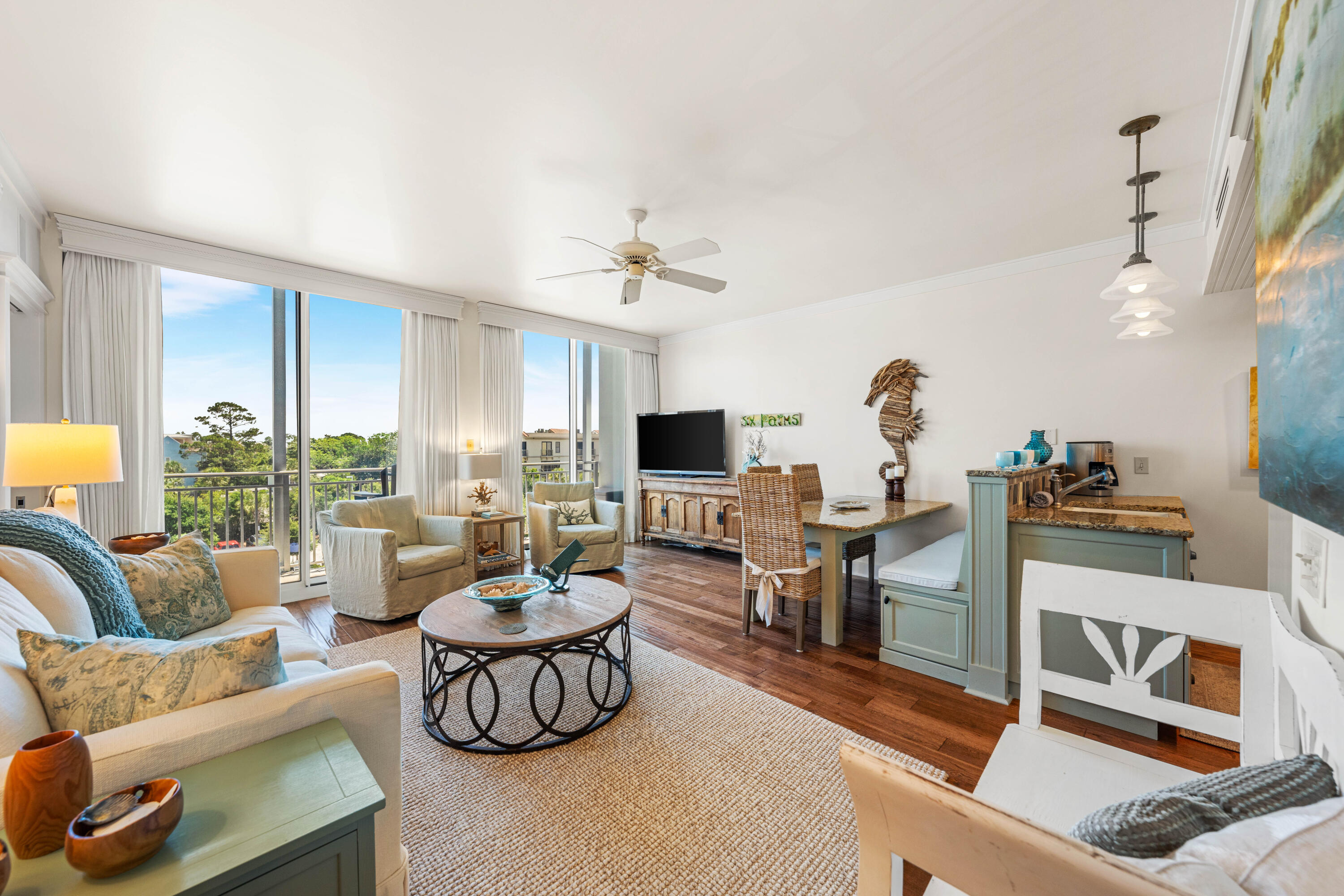 Top floor residence in Six Palms located in Gulf Place. This quaint condo is one of only 6 in the building and the only unit that has never been on a vacation rental program. Efficiently designed floor plan with open living, dining and kitchen spaces. This corner residence offers 2 bedrooms and 2 full baths. Delight in unobstructed gulf views, a mere 150 yards away, from the main bedroom and living room that both open to a generous covered porch. Enjoy the gulf breeze with a cup of coffee while watching the sunrise or an evening cocktail listening to music from Shunk Gulley just a stones throw away. Beautifully cared for residence with only one owner. Chic furnishings and accessories throughout from Beau Interiors and original artwork by local artists all convey with new ownership. granite dining table with banquette, updated primary bath, stainless steel appliances and custom blackout drapes are all part of the welcoming features of this special property. Gulf place offers an exceptional location with 3 pools, tennis, local shops, several restaurants and a short stroll to the beach. Three private beach access points gated for Gulf Place owners and guests. Excellent invest opportunity or second home.