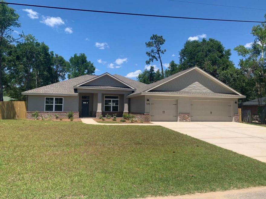 NEW CRAFTSMAN Custom Built Home ~This luxurious 4 bed/2 bath floor plan is under construction ~Great Central Location on an oversized lot with plenty of trees & with in walking distance to schools and local stores ~easy access to Hwy 87~Navarre Beach,Navarre Waterfront Park and Hwy 98 to Hurlburt Field AFB.This Stunning Robbins Builders Custom Home offers trend setting Features~Greeted by a walk in foyer sweeping through to your open floor plan~Large kitchen enjoying custom Shaker cabinets with crown molding, beautiful GRANITE counter tops~Under mount sink~S/S appliances ~Two pantries ~Center Island with sleek top breakfast bar & open flow to the dining area and large family room with Gorgeous vinyl plank flooring through the foyer/kitchen & main living area. Master bedroom has a tray ceiling /Master bath with plenty of dressing area with his and her large walk-in closets ~ oversized TILED walk in shower with seamless glass door ~Granite double vanity with rectangular under mount sinks ~picture frame mirrors and separated by a linen closet, all beautifully complimented by Brushed nickel fittings. Additional bedrooms are a great size with walk in closets and ceiling fans~Additional bathroom has a Granite vanity with a tub/shower~ All this and the home still offers an office/play room off the main family room with double glass doors and large utility room with a walk-in closet for additional storage. Welcoming long covered front porch and covered back porch to sit out and enjoy those wonderful Florida evening ~great to cook out and entertain. Garage is oversized with additional 6ft nook of storage space.Back yard faces East to enjoy the Florida sunrise~ Irrigation well and timed sprinkler system for easy care~ Hurricane protection for windows and dimensional shingle roof for lower insurance premium. Upgrades throughout include bullnose corners, knockdown ceilings, recessed lighting,deluxe lighting package,50 Gallon water heater, garage door remotes, attic drop down stairs~ to name a few......... Pictures are of a previous home and may vary in color and finishes....Call today for further information and construction status.