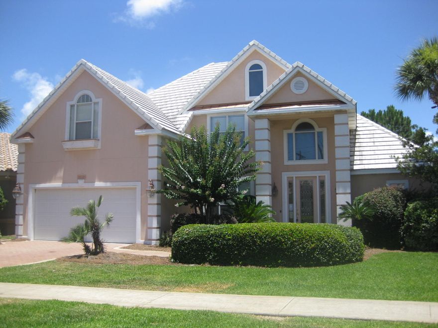 Your ''Destiny'' awaits... Beautiful and spacious 4 bedroom home in the very desirable gated community of Destiny East. Enjoy being right near the beach with loads of great amenities. This lovely home has lots of nice touches throughout including hardwood floors in the LR and halls, tiled entry/dining/kitchen & baths, double sided gas fireplace facing LR and breakfast nook, screened porch, spacious yard with nice paver patio, outdoor shower, 1st floor master BR, large bonus room upstairs. Located just a short walk to the clubhouse, pool and the beach. Also, just minutes from all that Destin has to offer. Come see this great home today!