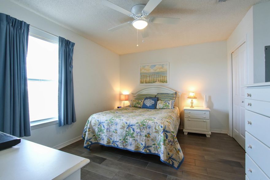 This lovely 1 bedroom with bunks condo has recently been redecorated, painted & wood look tile installed 2016. Enjoy the gulf views from this 3rd floor condo with oversized balcony. A/C replaced 2010 along with sleeper sofa (2014), refrigerator(2014), stove/oven(2013) and washer/Dryer(2012). The master bedroom has new beautiful furniture, window treatment and bedding as well. The kids will love the bunk beds in the hall and the sofa makes out to a bed. The mirrored wall enlarges the feel of the living area and wall hangings were recently purchased. The condo had a new roof in Winter 2005. Another great feature is the storage room for your beach chairs, etc... The property offers two swimming pools (heated Nov. to April), two whirlpool spas and barbecue area.