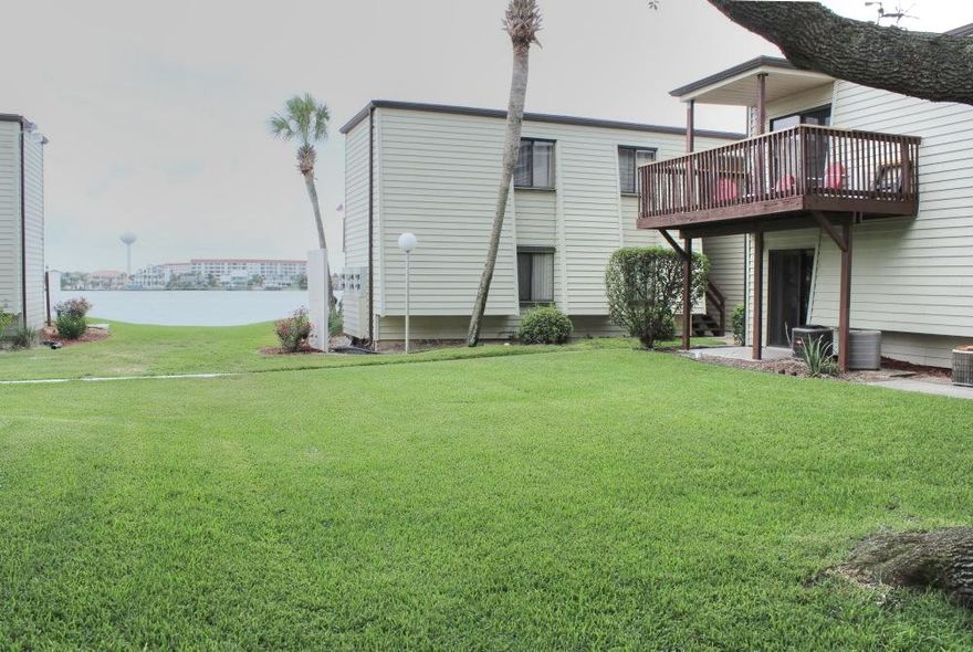 RENOVATED, ground-floor 1BR...tile floors, built-in bunks & did we say updated? Located VERY close to the sound, the patio backs up to a large & lovely green space with mature oaks. Love the water? Fountainhead is your answer, fish from the dock, launch a kayak or dock your boat also available beach area, waterfront pool,club house, laundry, tennis courts as well as parking for trailers and motorcycles.All just a short walk to fabulous restaurants, parks and shopping.
