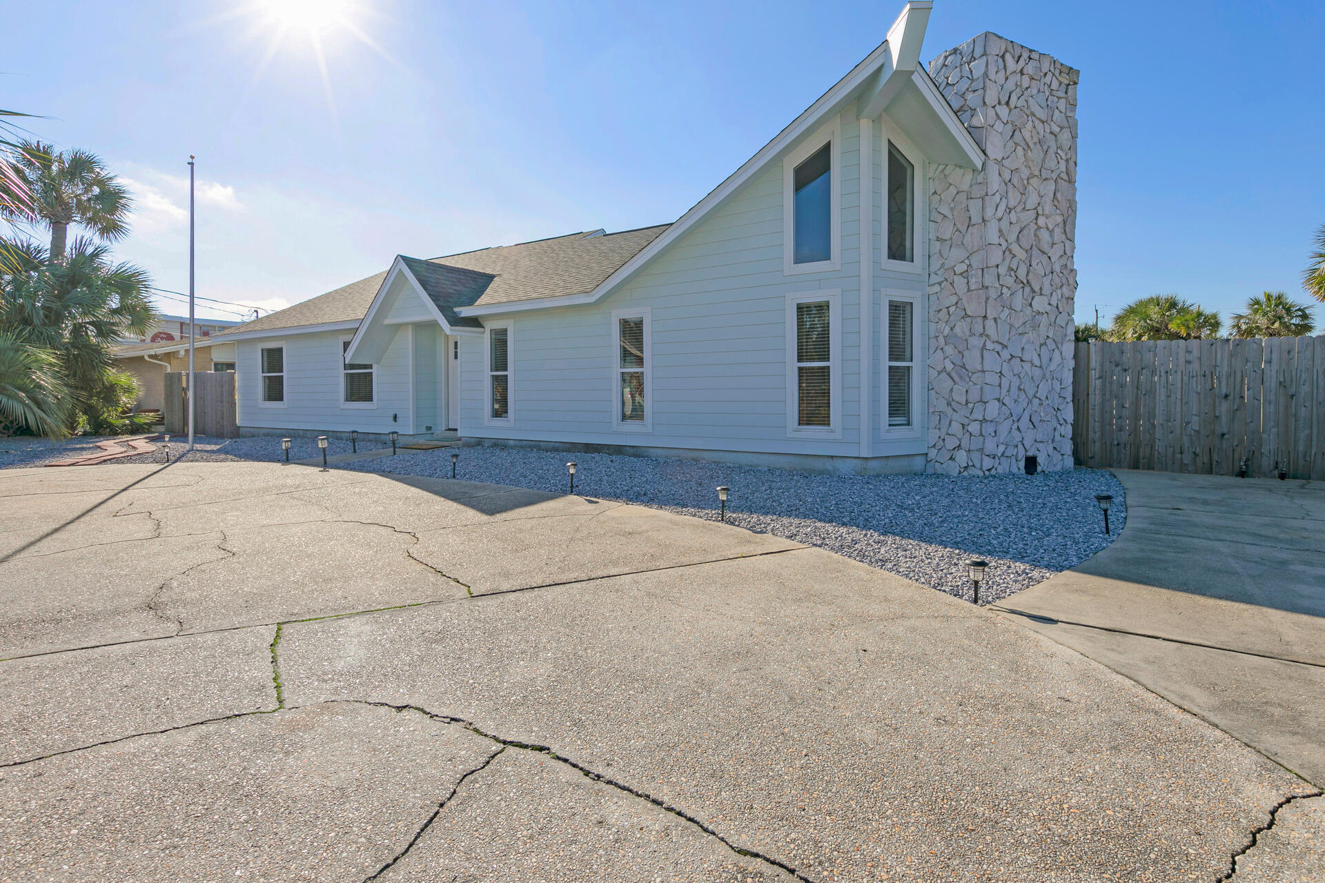 Welcome to 645 Porpoise! This one-of-a-kind, COMPLETELY REMODELED, 4 Bedroom, 3 Bath home boasts two kitchens, two washer/dryer hookups, and a mother-in-law suite. House has three french doors accessible to large, in the ground backyard pool from the main bedroom to the mother-in-law suite.   House is a block from the Ocean and a block from the Sound.  Ever wanted to live on an island?  Now you can...  Want to see the Sunset from the beach each night?  Now you can... Own a boat?  There are two boat launch locations just a few blocks from the house. Restaurants walking distance from your new home.  See weekly summer fireworks from your front yard - Welcome to Paradise!