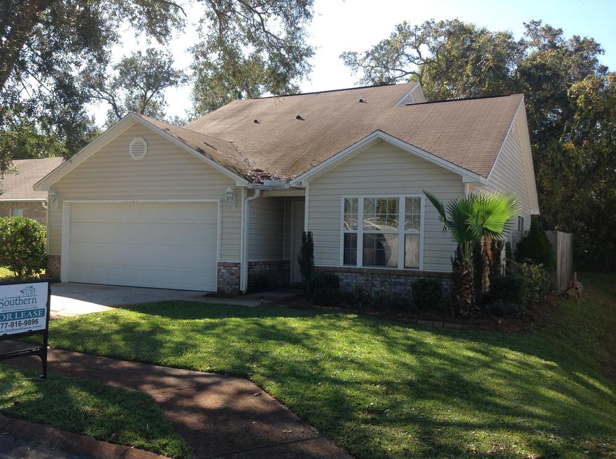 This beautiful 3BR/2.5BA unfurnished rental home is located in the heart of Fort Walton Beach and is conveniently located within a few minutes drive of both Hurlburt Field and Eglin Air Force Base. The inviting atmosphere can be experienced from the moment you enter. The open floor plan in the living room transitions throughout the whole home and even leads to your large and private fenced-in backyard, perfect for your pets to play. The home features a combination of flooring styles including wood floors in the living room and tile in the kitchen. Enjoy all your meals in this bright and open kitchen that is outfitted with a functional breakfast bar and charming eat-in nook. Located upstairs are two additional bedrooms and one guest bathroom. Comes with a washer and dryer "AS IS" for your convenience.  The 2 car garage will provide ample parking for all your vehicles or could even double as additional storage space.
