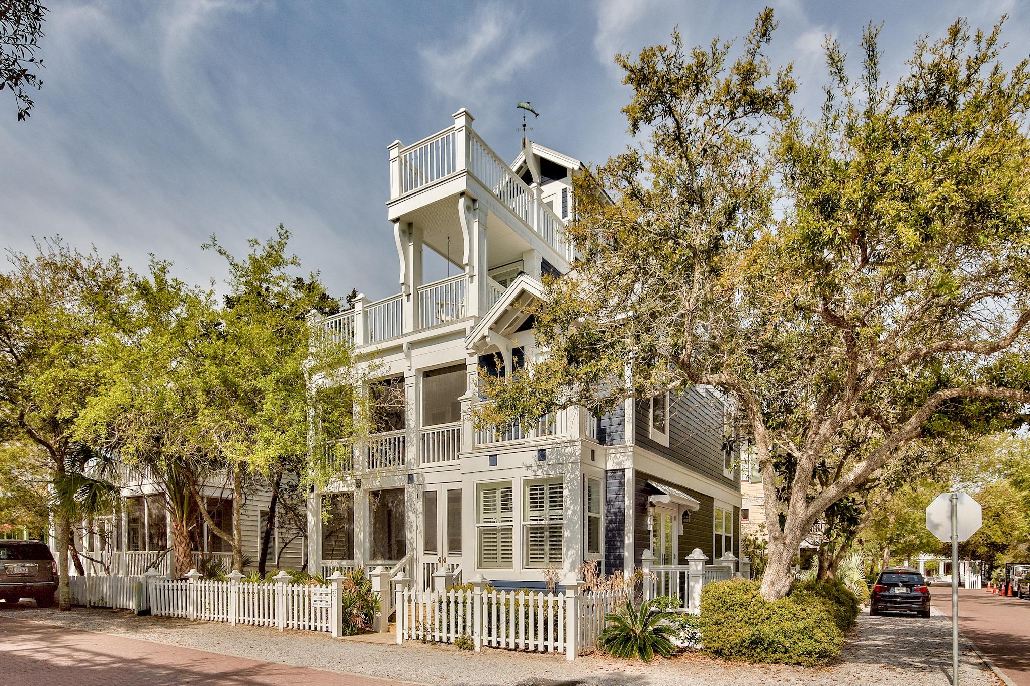 Come see this 3 bedroom, 3 bathroom Seaside home with extra sleeping quarters. This house offers great outdoor living space allowing for grilling off the back porch, listening to the waves from the decks, & relaxing on the front porch while you talk with your friends and neighbors. The location is on the corner of Odessa & Grayton Street, which allows for parking along two sides of the house. The 4 story home is 2,018 square feet with large balconies on each level & a roof top deck providing expansive views of the gulf & the Seaside community. The first floor contains a two story foyer, spacious kitchen, dining, & living room. The gulf access is one block away. The family pool with food service is across the street. Schedule your showing today to view this special Seaside beach house.