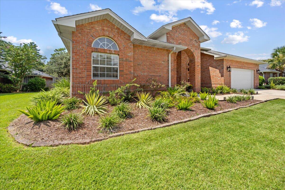 This beautifully updated Baypointe home offers all the upgrades you've been looking for in a well-maintained, move-in ready property. With a professional deep clean already completed and a home warranty included for buyers' peace of mind, you can settle in with confidence knowing every detail has been thoughtfully cared for.Inside, the split-bedroom floor plan provides both comfort and flexibility. Enjoy a spacious living room, private office, and a versatile bonus room that can serve as a second office, playroom, or formal dining space.The kitchen is the heart of the home with tall cabinets, granite countertops, a deep custom sink, and a large breakfast bar perfect for gathering. You'll also appreciate the newer stainless-steel appliances. dishwasher, stove, and microwave range hood-plus updated sinks, fixtures, lighting, and ceiling fans throughout.
The primary suite is a true retreat, featuring two walk-in closets, tray ceiling detail, and a spa-inspired bathroom with a huge soaking tub, newly tiled shower and surround, and granite countertops.
Additional highlights include:
Newer wood laminate flooring & newer tile in main living areas
Crown molding and upgraded trim details
Cozy fireplace with decorative tile surround (capped but convertible back to wood-burning if desired)
Laundry room with cabinets and a granite-topped utility sink
Newly installed French doors leading to the backyard patio
Step outside to a private, tree-lined backyard complete with a brand-new storage shed and plenty of space to relax or entertain.
This home has been lovingly upgraded from top to bottom, including a new roof, and is truly move-in ready. With a home warranty included, it's the perfect blend of style, function, and peace of mind.
Conveniently located in Harvell's Crossing in Navarre, just minutes from local schools, shops, dining, and the beautiful Gulf Coast beaches.