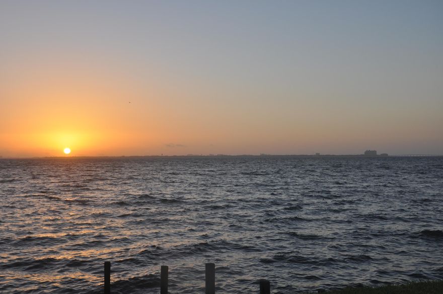 Impressive Private Waterfront .72 Acre Estate in Lake Lorraine overlooking  Choctawhatchee Bay with circular driveway!  Beautiful CUSTOM built one owner home has Hurricane Coverings, a Metal  Standing Seam Roof.  Inside is  Spacious and open 4400+sq ft home includes 4 bedrooms, 3 Full baths( 6445 Total square feet), Large Recreation room,  with Custom built-in  Cabinetry and Hardwood Floors & Tile through out, Family Room with Matching Wall Unit Bookcases either side of Marble Gas Fireplace. Large Dining Room and  Formal Living Room centrally located and positioned with Large Windows Front and Back allowing views  throughout.