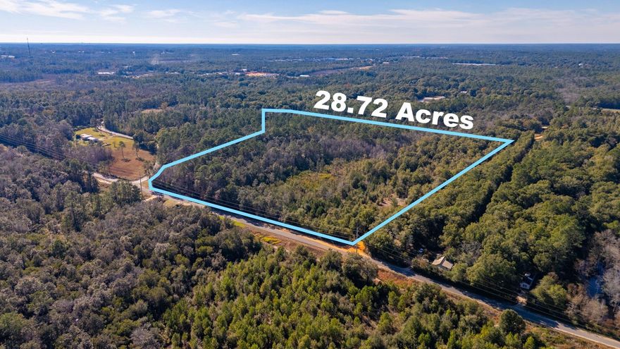 Have you been looking for acreage? Look no further. Over 28 acres to make all your dreams come true. This property borders 3 roads (Spradlin Rd, Davis Dr, & Old Landfill Rd). Two of which are paved & only a 5 minute drive into town. There is a creek that runs through the property. Build your own homestead or subdivide. As this property is zoned Urban residential. Which will allow an array of developmental options. Public water is available on Spradlin Rd but the tap fee is due. Adjoining 10.83 acres is also for sale & can be purchased together or separately. DO NOT GO ON THE PROPERTY WITHOUT AN APPOINTMENT WITH A REAL ESTATE AGENT.