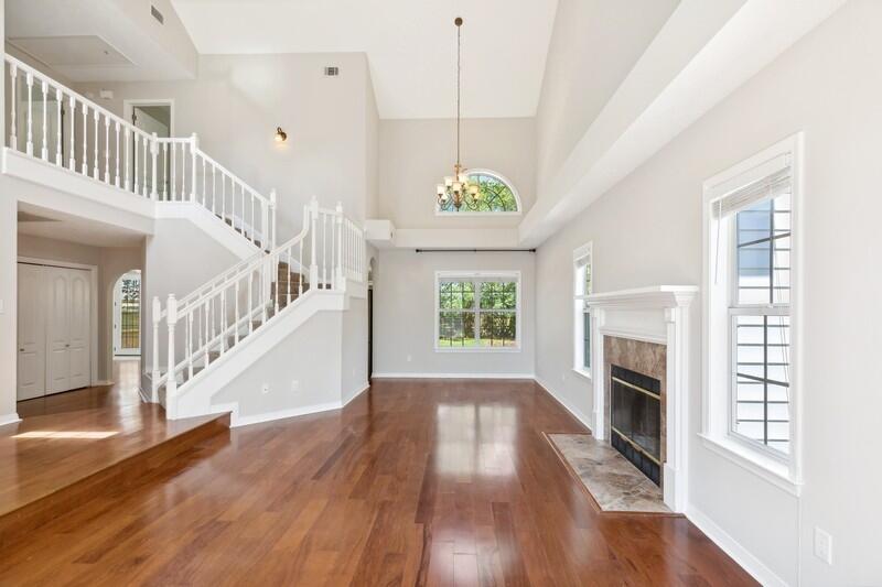 This upgraded, updated custom Parkwood Estates Home is well-maintained with 2024 Roof, fresh paint throughout, and professional landscaping. Each bedroom has an en suite with full bath. Tall 23-foot ceilings beckon you to relax by the fireplace or take in the garden views within the fully privacy-fenced backyard. Enjoy cooking in your well-appointed kitchen with stainless appliances, pantry, granite countertopss, an island w/breakfast bar and dining area with French doors to paver patio. A mother-in-law suite with bath, & walk-in closet on the first floor. Find Upstairs 2 more bedrooms share a bath w/dual vanity, plus a sprawling primary suite w/ walk-in closet, garden tub and separate shower w/glass door. Move-in Ready. 2.875% Assumable VA Mortgage is potentially an option.