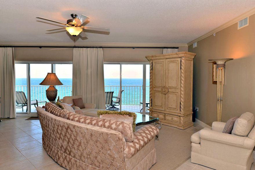 MOTIVATED SELLER ~~ WILL CONSIDER OWNER FINANCING WITH SUBSTANTIAL AMOUNT DOWN!! THE GREAT ESCAPE - you may come just to escape from the hustle & bustle of everyday life, however, some places like this one will beckon you to never leave. Fabulous updated gulf front condo in one of the most elegant complexes in the area. The open floor plan showcases the endless views of the water & beaches. Lovely rooms furnished with quality furniture & materials are featured throughout. The kitchen has beautiful granite counter tops along with stainless appliances, & the baths have been customized with attractive tile work. All rooms are spacious & there is even a cute bunk room for three. Other features include custom draperies, crown molding, plantation shutters, a large laundry room, & spacious