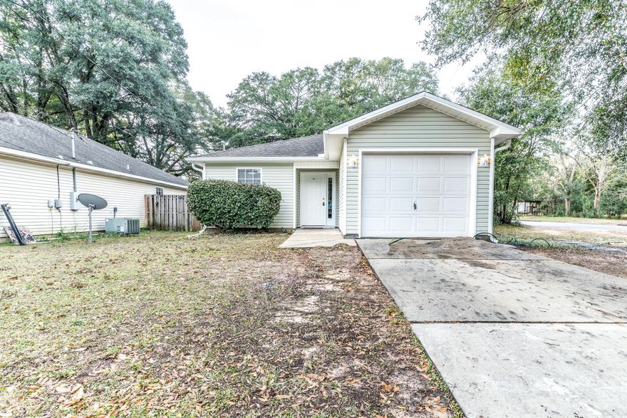 Check out this 3 bedroom/2 bath/1 Car Garage home conveniently located in the center of Crestview just south of Hwy 90 with convenient access to Eglin AFB/7th Group/Duke Field and within walking distance to Twin Hills Park and the new Dog Park (coming soon). This freshly painted home features an great open concept design (kitchen, dining/living room) with tile flooring perfect for entertaining friends and family alike. The bedrooms are nice sized with ample closet space. Just off the living room is a covered rear porch with privacy fenced backyard and mature trees for plenty of shade in the summer. This home is being offered with a one year home warranty for buyers piece of mind. Schedule your showing today!