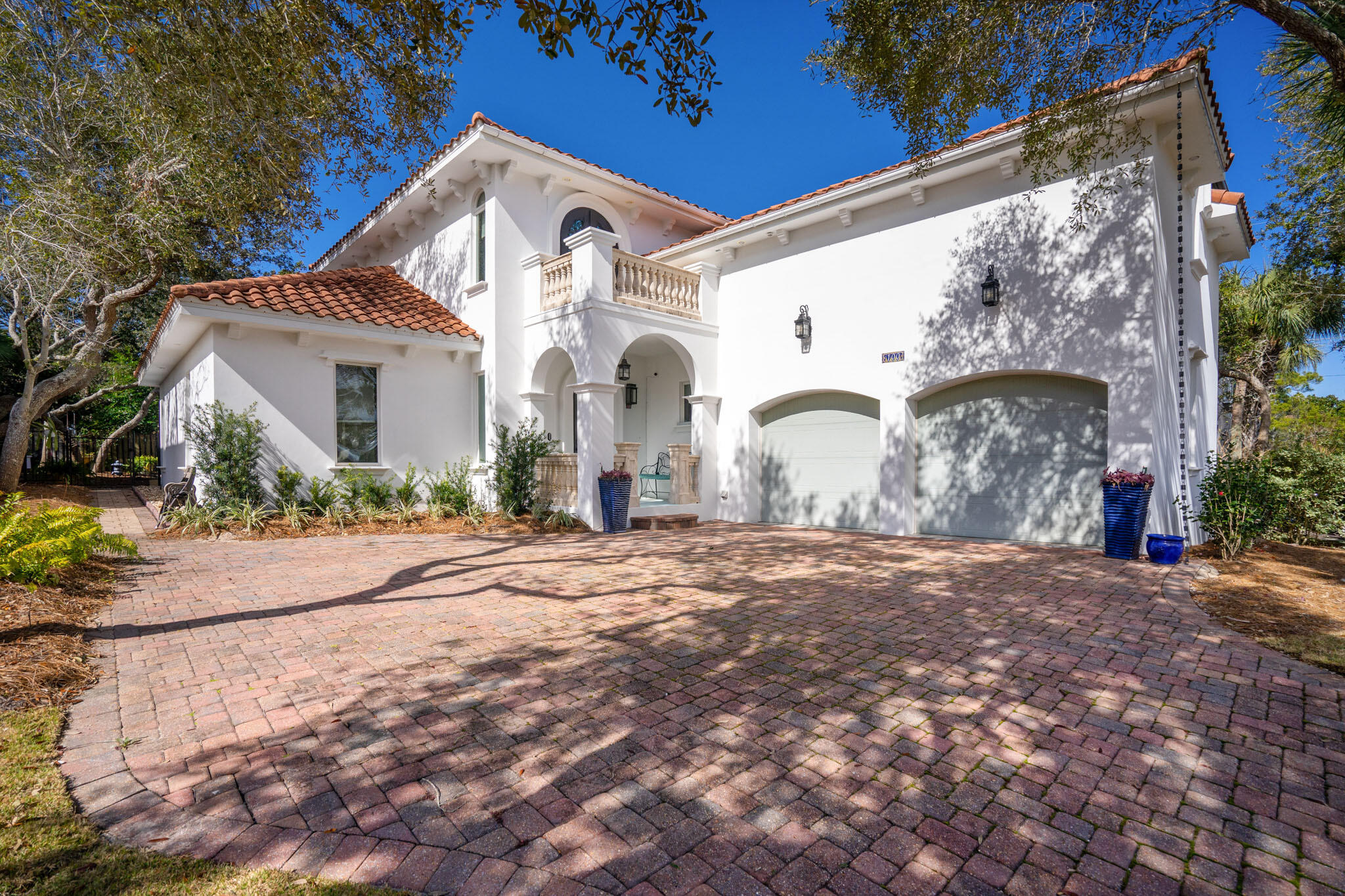 This amazing Mediterranean villa located in One of Destin's favorite neighborhoods, Destiny West is a gated community situated directly across Scenic 98 from the stunning white sand beaches and sparkling waters of the Emerald Coast! Besides the beach, Destiny's amenities include a clubhouse, fitness center, swimming pool, hot tub, tennis, basketball court and gated access. This home provides luxury, conveniences and a practical floorplan well suited to modern lifestyles! Made of ICF construction and located on a cul-de-sac, The primary living area is on the first floor, plus the property offers incredible outdoor living, dining, relaxing, and entertaining spaces surrounding the gorgeous salt-water pool.