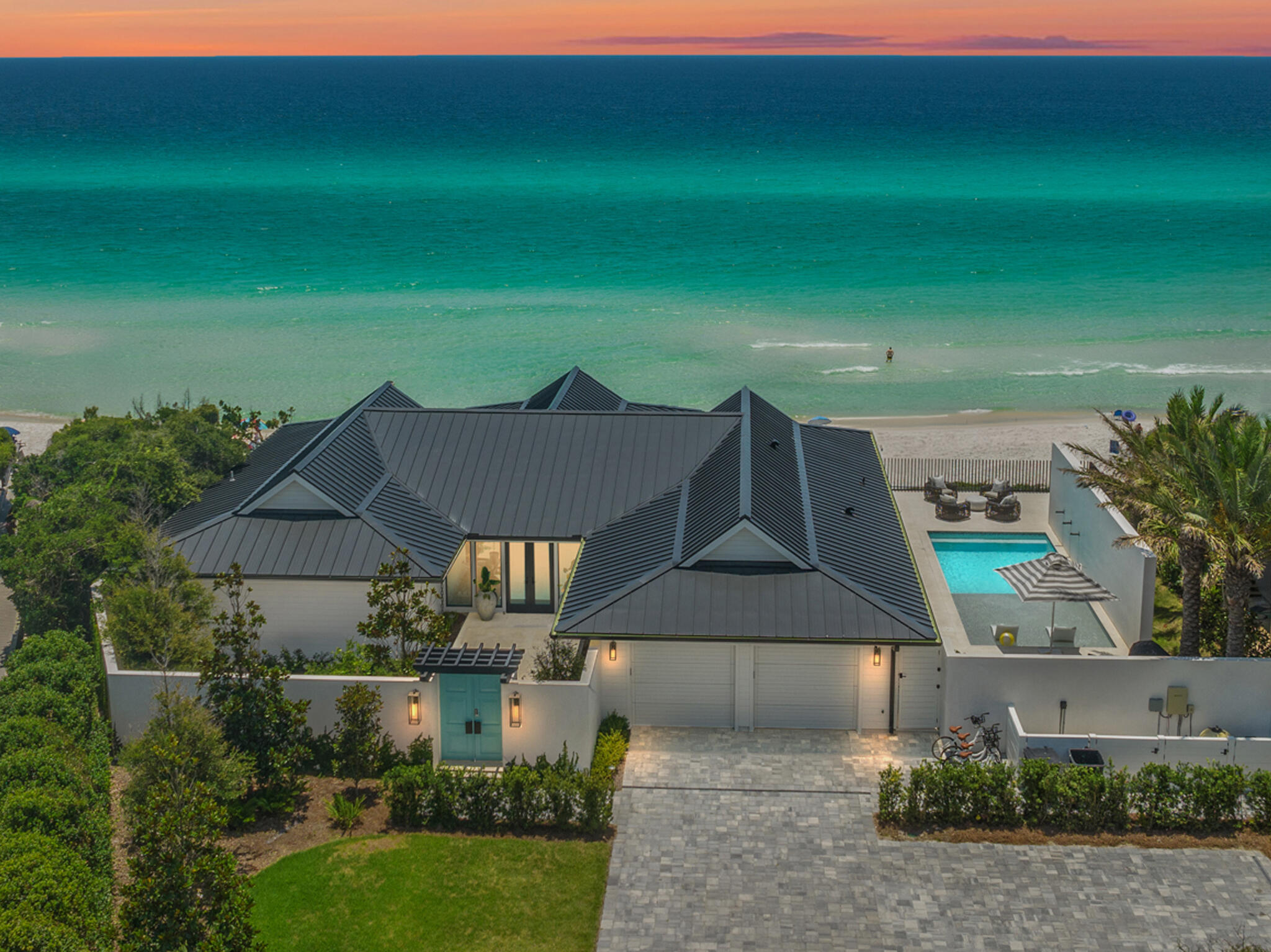 Discover the epitome of modern coastal luxury with this breathtaking gulf front property, meticulously crafted and reimagined by A BOHEME Design and Galvas Construction. Located on an expansive 152.5 feet of pristine gulf frontage, this stunning home offers a rare opportunity to own a piece of paradise in one of the most coveted locations. With .66 acres at your disposal, this legacy property has room to grow! This exquisite residence features four bedrooms and four and a half bathrooms, spread across approximately 2,700 square feet of elegantly designed living space. The one-level floor plan boasts expansive gulf views from three bedrooms, the kitchen, dining and the living area, allowing you to wake up to the serene sight of the Gulf every day. The interiors, curated by Tony Cappoli, exude sophistication and comfort, creating an inviting and elegant atmosphere throughout the home. The gourmet kitchen is a chef's dream with JennAir appliances, custom cabinet front appliances, including an ice maker, dishwasher, and wine fridge, perfect for entertaining guests.
Outdoor living is at its finest with extensive covered porch space, providing the ideal setting for dining, relaxation, and soaking in the stunning sunsets over the Gulf. Direct access to the beach ensures that the white sands and crystal-clear waters are always just steps away. With two separated garage spaces and driveway parking for over ten vehicles, accommodating guests and family is effortless.
This property underwent a comprehensive renovation project, leaving no stone unturned. Everything from windows and doors to the roof and concrete footers has been replaced, ensuring a brand-new, state- of-the-art living experience. Situated further seaward of the Coastal Construction Control Line (CCCL) than surrounding properties, this home offers unparalleled panoramic views and a unique vantage point that is truly one-of-a-kind.
This gulf front gem represents the perfect blend of modern luxury and timeless design, making it an ideal retreat for those seeking a serene lifestyle. Whether you are looking for a permanent residence, a vacation home, or an investment property, this home offers an unparalleled living experience. Embrace the beauty, tranquility, and prestige of this exceptional property. Contact us today to schedule a private showing and take the first step toward owning your dream home on the Gulf.