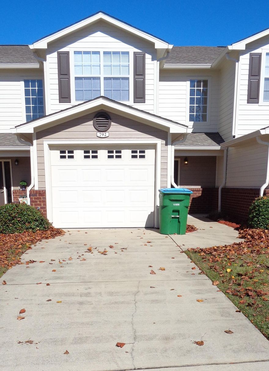 Location, Location, Location! Located in Eagles Landing, a highly sought after community! 2 bedroom, 2.5 bathroom with a single car garage, under stairs storage. Lots of crown molding, ceiling fans in living and bedrooms. There are two masters, yes, two masters, both with on-suite bathrooms. Both bedrooms have a walk in closet, back master has an additional smaller closet. Kitchen has flat top stove with microwave, refrigerator with ice maker, dishwasher & disposal.  This townhome backs to an open area & the pool & clubhouse. Measurements are approximate, verify as needed. Selling Brokerage & Eagles Landing Townhomes are owned by the same parent company.