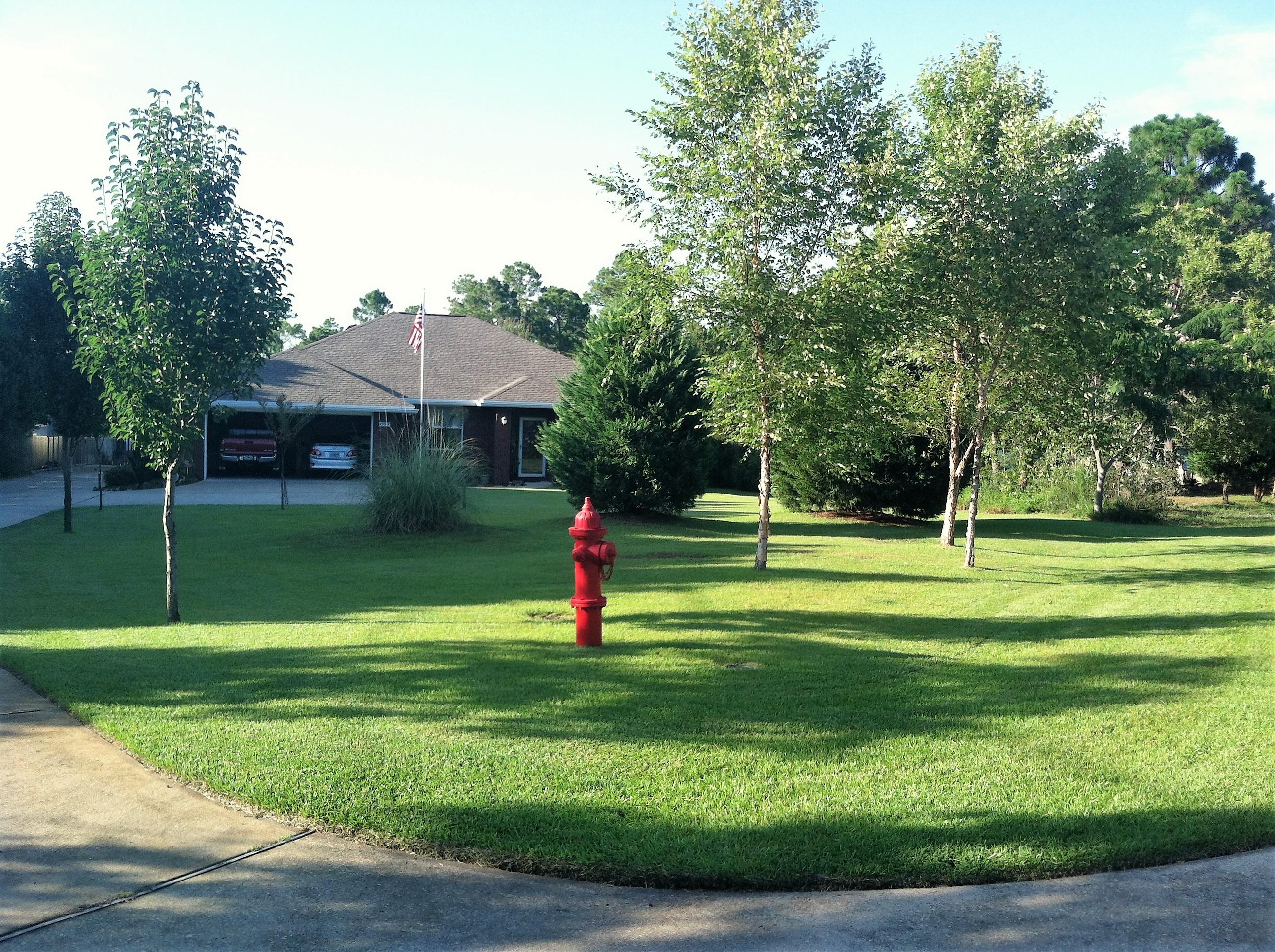 BEAUTIFUL RIVERFRONT HOME IN NAVARRE! THIS ONE-STORY ALL BRICK HOME IS SITUATED ON NEARLY 1.5 ACRES OF LAND. THE HOME FEATURES TILE AND HARDWOOD THROUGHOUT. A SPLIT FLOOR PLAN FOR EXTRA PRIVACY. MASTER BEDROOM HAS ITS OWN PRIVATE BATHROOM WITH DUAL VANITIES AND A WALK IN CLOSET! TWO ADDITIONAL ROOMS AND YOUR OWN IN HOME OFFICE! KITCHEN FEATURES STAINLESS STEEL APPLIANCES!THE BACKYARD IS LARGE AND PRIVATE AND FEATURES A COVERED AWNING, A TWO-STORY WORKSHOP! AND BACK GARAGE THAT IS PRE-WIRED AND CAN BE CONVERTED INTO A GUEST HOUSE! FULL RV HOOKUPS!! RAISED GARDEN BEDS!THERE IS A FIRE-PIT PERFECT FOR ENTERTAINING GUESTS!! A SHORT WALK FROM THE BACK OF THE HOUSE LEADS YOU DOWN TO YOUR OWN DOCK! WHERE THE RIVER IS LIVELY AND GREAT FOR FISHING AND SWIMMING! THIS HOME IS WAITING FOR IS YOU!