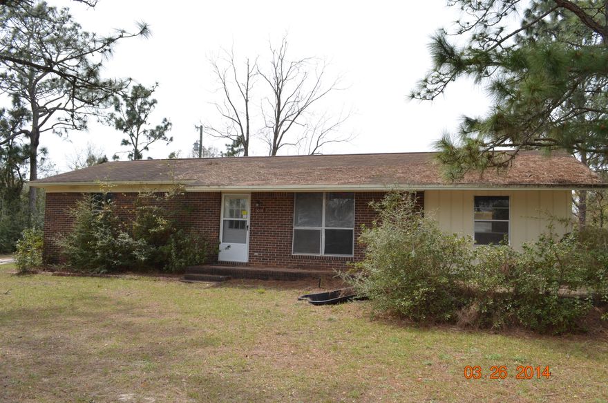 With a little elbow grease this 1224 sf home could easily be a great first home or rental property. Built in 1981 this home has all brick exterior with covered patio out back and rests on 1/2 acre. The interior has paneling, kitchen with dining area 3 bedrooms and a full bath. This home has lots of potential and is could still be considered country living but close enough to town for shopping and other amenities. Call today for your showing!