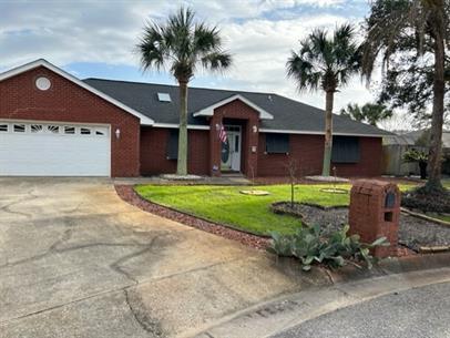 This Beautiful 3 bedroom home with adjoining sunroom sits on a quiet cul-de-sac in Gulf Breeze. The Great room features Cathedral ceilings with skylights which make this home light and bright. The Large master bedroom has two walk in closets. Other features include double vanities and a garden tub in the Master Bath. Home is currently occupied but will be available approximately August 8th. Contact Navarre Beach Realty at pm@navarrebeachrealty.com, 850-936-0700 or come by the office at 8666 Navarre Parkway in the Winn Dixie Shopping Center. Office hours are Monday through Friday 9am-5pm.