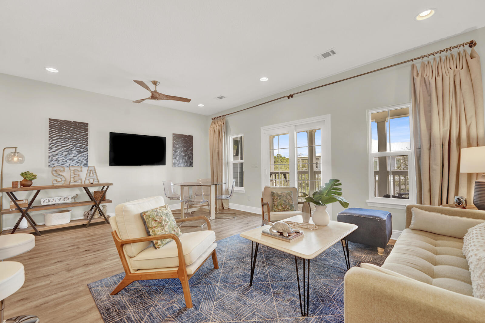 The best location on Panama City Beach! Enjoy Lake Powell, the Gulf of Mexico, and a community pool just steps from your door. This waterfront community offers a dock and lakefront pool on the largest dune lake in the USA--perfect for water lovers. Take the included boat to the nearby state park and enjoy your own private getaway. This fully furnished, professionally decorated townhome boasts quartz countertops, stainless appliances, hardwood shaker cabinets, tiled backsplash, and LVP flooring. The spacious master suite features a double vanity and tiled shower/tub combo, while additional bedrooms share a stylish bath. Relax on the porch with views of the pool and lake. All measurements approximate; buyer to verify.