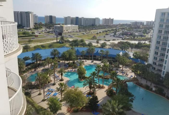 Destin's most popular LIVE, WORK, PLAY, all inclusive resort. 7TH STORY two bedroom, two bath master suite unit, largest floor plan in The Palms. Spacious balcony's with a beautiful view of the Gulf. Amenities include a large lagoon, pool, restaurant and lounge, complimentary shuttle to Henderson Beach, luxury spa, basketball and tennis courts and a short walk to shopping. This unit has never been on a rental program.