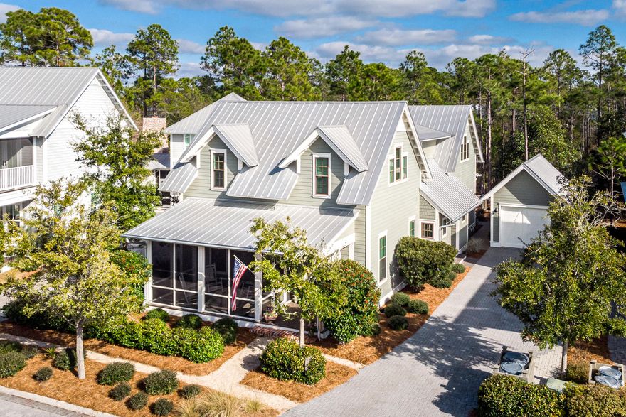 Located in the coveted Watercolor Crossings District community, this Greg Jazayeri designed home has three bedrooms plus a bunk area, has never been rented and is in pristine condition. Its welcoming front porch transports you to this coastal retreat's entry featuring beautiful wire brushed oak hardwood floors, 10-foot ceilings, scores of natural light and full V-grove walls. The expansive kitchen offers a large center island with Bianco Romano countertops throughout, GE Monogram Series appliances with a gas stove top and vented hood, a farmhouse sink, large walk-in pantry and custom cabinetry with under cabinet lighting and easy glide drawers fit for a chef. Located off of the kitchen are a full-size laundry room, an office, and a wet...
