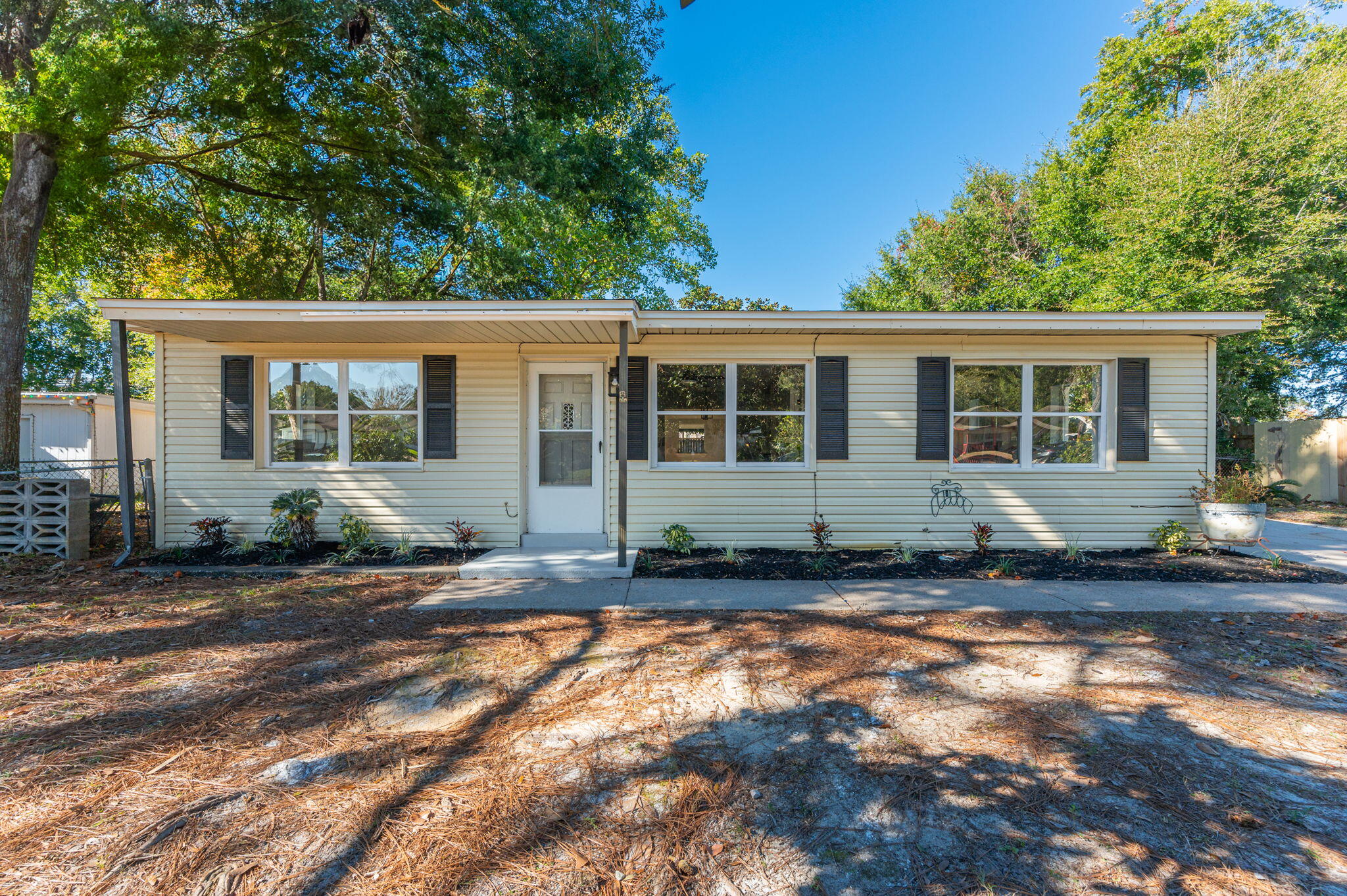 Beautifully remodeled home in the heart of Mary Esther, FL. This 3 bedroom 2 bath home has been remodeled with all new LVP flooring, paint, and lighting. The kitchen boasts brand new stainless appliances as well as quartz counters and plenty of cabinets for all of your needs! There is a bonus family room in the back of the house as well as a large screen room with tile flooring!