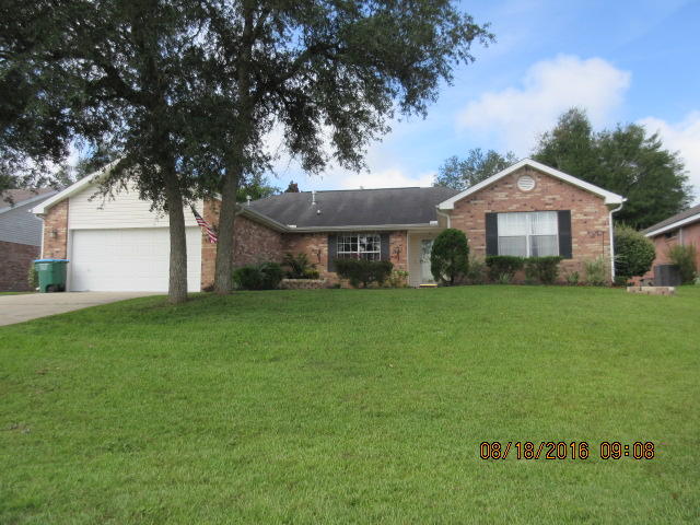 You'll love this Brick ranch style home. It's beautiful backyard AND it's LOCATION! This four bedroom two bath has a split floor plan!! Home will give you 2190 generous square foot of living space. Wake up each morning to coffee on the screened porch surrounded by beautiful landscaping. Enjoy your cold weather nights cuddled by the wood burning fireplace. 4 bedrooms (Master with En Suite bathroom), 2 full baths, living room space features fireplace, vaulted ceilings with lighted plant ledge, formal dining room, laundry/mud room, ceiling fans throughout house, kitchen is over sized with vaulted ceiling offering an island and eat in dining area, all new stainless steel appliances, enameled cast iron sink, new faucet, new tiled floor