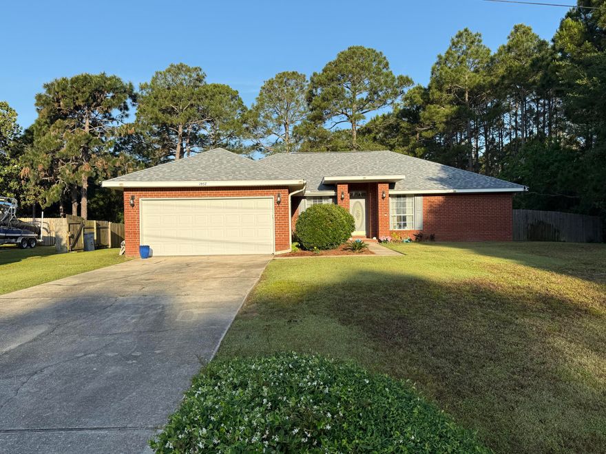 Move-In Ready Home with Solar Power and Fantastic Amenities!  Welcome to this beautiful, move-in ready home featuring a bright, open floor plan with vaulted ceilings and stylish wood laminate flooring. The Spacious Kitchen offers stainless steel appliances, a double oven, breakfast bar, pantry, and a charming breakfast nook with a large window overlooking the oversized, privacy-fenced back yard. The living room flows seamlessly into a separate dining area, perfect for gatherings. The primary suite is a true retreat with two walk-in closets and a luxurious bath boasting double vanities and a garden tub. Two additional guest bedrooms are generously sized and share a full guest bathroom. The interior laundry room leads to a 2-car garage, and the backyard includes a storage shed, 30AMP RV hookup, and a double RV gate! The vacant lot next door, owned by the association, adds extra privacy and green space!
Solar panels were recently installed, with a super low payment of $219/month to be assumed by the buyerask for lender options that allow this excellent value! Recent Updates: Roof replaced in 2021; Water heater replaced in 2023; Garage door replaced in 2019. HVAC exterior unit (9 years old) and working well.  Enjoy all the incredible amenities of Holley By The Sea, including a waterfront park and dock, multiple pools, full gym and weight room, recreation center, activity center, childcare services, and more! Don't miss this fantastic opportunityschedule your showing today!
