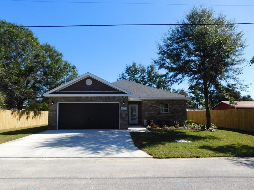 Kitchen Island Added! Builder WILL PAY MOST CLOSING COSTS. (Ask for details.) This is a Beautiful 3/2/2 ALL BRICK Home with Upgrades Galore! 9ft Ceilings! Gorgeous Tile throughout the entire Living Area, Kitchen, Hallway, Laundry Room and Baths! Carpet in the bedrooms. The Kitchen has abundant Granite Countertops, A Breakfast Bar, Wood Cabinets, Stainless Appliances (including a side-by-side Refrigerator!) and a pantry. Covered Lanai! Sprinkler System and Lawn Pump included! See features List in Photos.