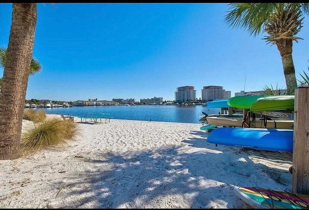 Beautiful Turn-Key vacation rental/or permanent residence with the key upgrades of a Master Craftsman. Full view of Destin Harbor. New AC All Bathrooms Newly Renovated New Washer/Dryer /New Appliances/ Ship lap Premium mohawk flooring Impact Windows and Sliding Doors. New shaker Kitchen Cabinet Soft Closing/Lincoln quartz Property projected to make more than $45,000/year with short term rental.Walking distance to the private BEAUTIFUL Destin white sand crystal Beach. Comes with a 15' x 5' storage that can be divided into owner storage or vacation rental storage. Located on the 4th floor overlooking the Destin Harbor. Tennis/pickleball court Last but not least... VIEW the dolphins swimming around from your private bal