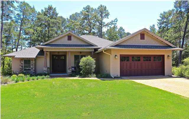 All brick ranch on 1/3 acre in the security of the coastal sanctuary of Wild Heron. Completed in 2012, this nearly new home has a split floor plan with a large master suite. Master bath has a walk in shower and jetted soaking tub. The Kitchen has granite counter top , gas range, plenty of cabinetry and a pantry. Great room is open to formal dining area and breakfast nook.Hardwood flooring in main living areas and hallways, with tile in baths and laundry. A wall of windows as well as French doors open to the 22 foot long back porch.