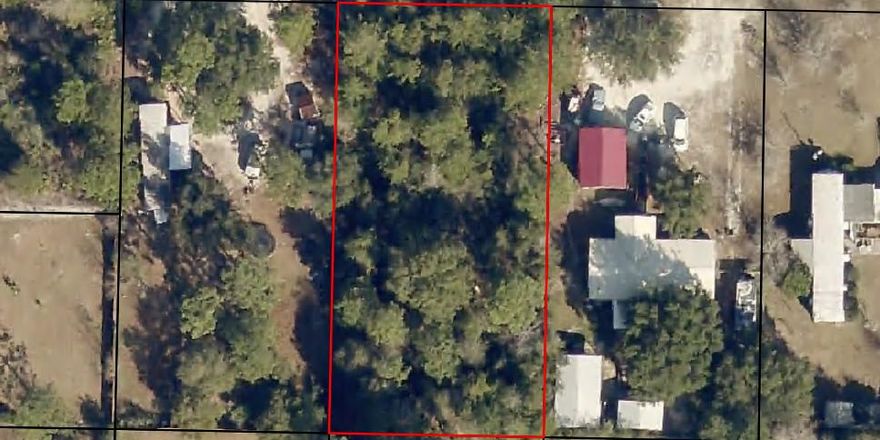 Nice, high and dry lot in developing area of Navarre. Close to schools, shopping and the beach.