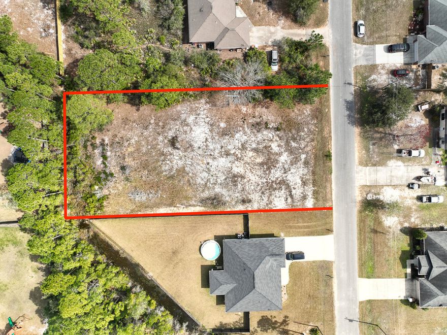 Location! Location! Location! Wonderful opportunity to build your charming beach home in a quiet and friendly neighborhood in Navarre.  Living here you are a minutes away from the famous beautiful white sandy beaches and Emerald green waters of Navarre Beach..  Navarre offers a variety of restaurants, shopping medical facilities and attractions.  Let's not forget about Navarre's 5 elementary schools, 2 middle schools and high school for your convenience. Easy access to Hurlburt Field, Hwy 98, Hwy 87, and I10. Don't miss out on this opportunity to live in paradise.  Come and see today!  Buyers to verify all information.