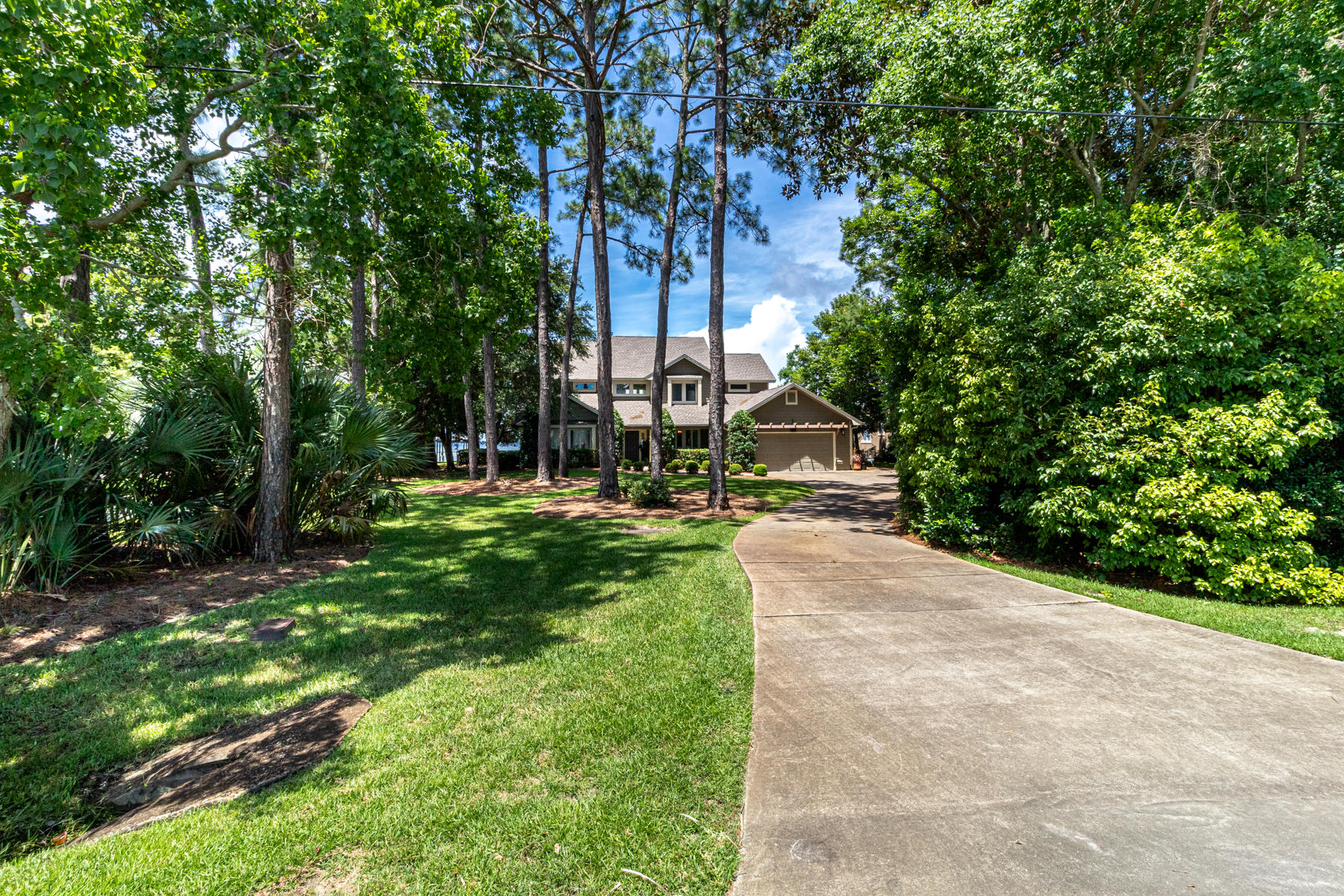 Bay Front Living, Outdoor Living, with the best location on the Emerald Coast...thats what 780 Shore Dr has to offer. Cedar Wood siding, travertine floors with an open floor plan for all the natural lighting you want. The Master Suite is on the main level with a den and an office. The guest rooms are on the second floor.After you put your BOATS & the Jets skis on their LIFTS walk on the Thru Flo dock to the outdoor kitchen and jump in the HEATED pool, or hot tub, you can rinse off in the Pool house and enjoy the gas starter fire pit with a Jasmine wall for your privacy. New Roof in 2019, Brand new Culligan Rust Removal System and new pump on the well for the irragartion New Pool TileUnder Cover Boat lift 32'(18 tons). Second boat slip will hold sail boat or any vessell up to 25ft