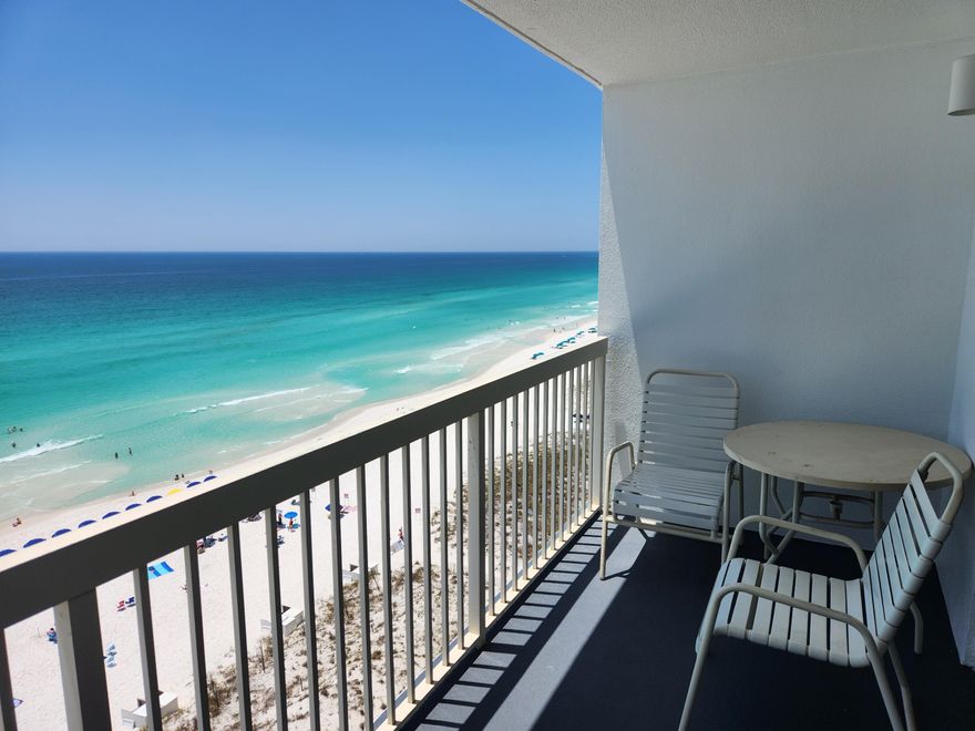 Pelican Beach resort #1203 is ready for new owners! Located in the ''sweet spot'' of Pelican Beach Resort, unit #1203 boasts endless views of the Gulf. Assessments have been paid in full. Everything in unit conveys and rental ready.  Rental income for 2022 was $48,448.65. YTD rentals and bookings are at $7,164.32. New 114 ft. zero entry pool right on beach w/12-seat spa, tennis court, covered parking, TIKI bar, Cafe, game room, sauna. Unit is a vacation rental subject to bookings