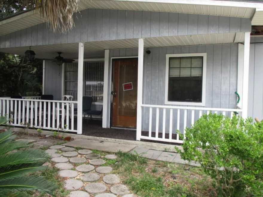 3 Bedroom home with an extra room added on in the living area. There is also extra storage in the laundry room/area . Large lot. Great front Porch to sit ont and enjoy the day.