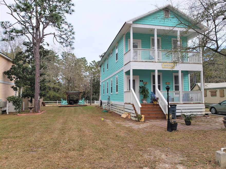 Custom beach style home just 3 miles from the emerald waters of the Gulf of Mexico and less than a mile from the Cessna Park with a public boat ramp. This home includes 2 additional lots for expanded enjoyment or for future development. 10 ft ceilings on main floor, custom cabinets, large windows, and tile floors enhance the true beach feel. Outside, there is a large parking pad with a 30 Amp RV plug and an additional 30 Amp RV plug on the other side of the home. A 10 X 16 shed with lawn mower add-on and a large covered deck for grilling are located in back.