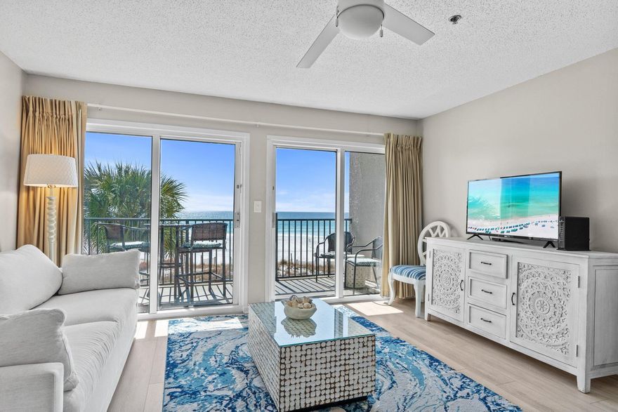 If you're looking for an investment property with great rentability right on the beach, look no further! Windancer 209 is a gorgeous, turn-key one bedroom condo located in one of the most private complexes Miramar Beach has to offer.Even as you open the main door, you'll see the crystal blue waters of the Gulf. The entire front wall of the living area boasts floor to ceiling double sliding glass doors, flooding the room with natural light. Through the sliding glass lies a balcony that easily has enough space for a table and multiple chairs - plenty of room for you and your guests to enjoy a morning coffee with the dolphins or an evening beverage over sunset.The open concept is beachy chic with soft colors, clean white accents, and luxury vinyl flooring throughout. Your guests have multiple options for seating - the luxurious couch, deep chaise and ottoman, dining table and chairs, or counter height bar stools - ensuring comfort for all. In the fully remodeled kitchen, you'll find stainless steel appliances, a mini coffee bar, gorgeous quartz countertops, modern white cabinets, and all the supplies you'll need to savor your meals, whether you're cooking in or taking out. Additionally, the condo offers a new HVAC unit installed last year with a UV-Aire Purification System incorporated into the A/C, so you and your guests can literally breathe easy.
Believe it or not, this one bedroom condo easily sleeps six. With a pull out queen-sized couch and hallway bunkbeds, the kiddos (or adults) have plenty of space. The master bedroom provides a king-sized bed, a spacious ensuite bathroom, and even a laundry closet with a full sized stackable washer and dryer (brand new last year)! With an additional half-bath next to the bunk area, everyone has the room they need to relax and enjoy.
Property amenities include a private parking lot and direct beach access, community grills, and a beachside pool where you can lounge and still enjoy the view of the Gulf. Whether you're walking, driving, or taking a golf cart, shopping and dining are only moments away! Silver Sands Outlet Mall (with more than 120 shops and a dozen eateries) is less than 0.5 miles from this condo. You'll also find a variety of restaurants down Scenic Gulf Dr, which runs right along the beach. For your personal use or for your personal investment, Windancer 209 is truly one of the best condominiums on the Emerald Coast! 

