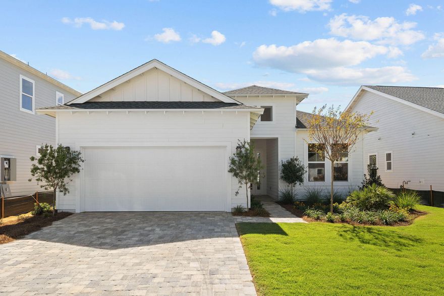 Overlooking the water, this spacious and functional 4 Bedroom floorplan features a large Island Kitchen overlooking an open main living area, perfect for hosting family and friends year-round. The large windows and French doors lining the Great Room's rear wall welcome in lots of Florida sunshine and keep the home bright and inviting. The design offers split bedrooms with a large Master Suite in the rear, offering dual vanities, a large walk-in closet, and an oversized shower with options to include a free-standing tub. The two secondary bedrooms are located in the front of the home, with Suite 3 offering an en suite Bath. The Den provides a perfect home office, gym, or hobby space, and with an option to include double doors, you can increase the privacy and functionality of the space.
