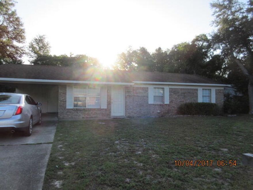 Cute all brick home close to shopping, churches and bases.