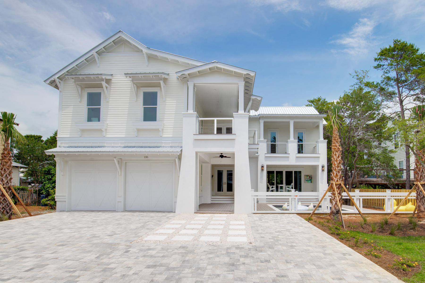 Brand New and SOUTH of 30A. Just STEPS to the beach, this beautiful 6br home features almost 4000 sf of heated and cooled space, You will notice the distinctive architecture the minute you arrive. The towering vestibule provides entry to the courtyard swimming oasis which is surrounded by large decks and patios. Inside, you will find an open floorplan with an amazing kitchen adorned with quartz countertops, 42 inch gas range, wine cooler, ice maker, and more. There is a downstairs master and extra bedroom on the main level. The upstairs features four additional suites, breakfast kitchen and separate sitting area. Schedule your exclusive showing today!