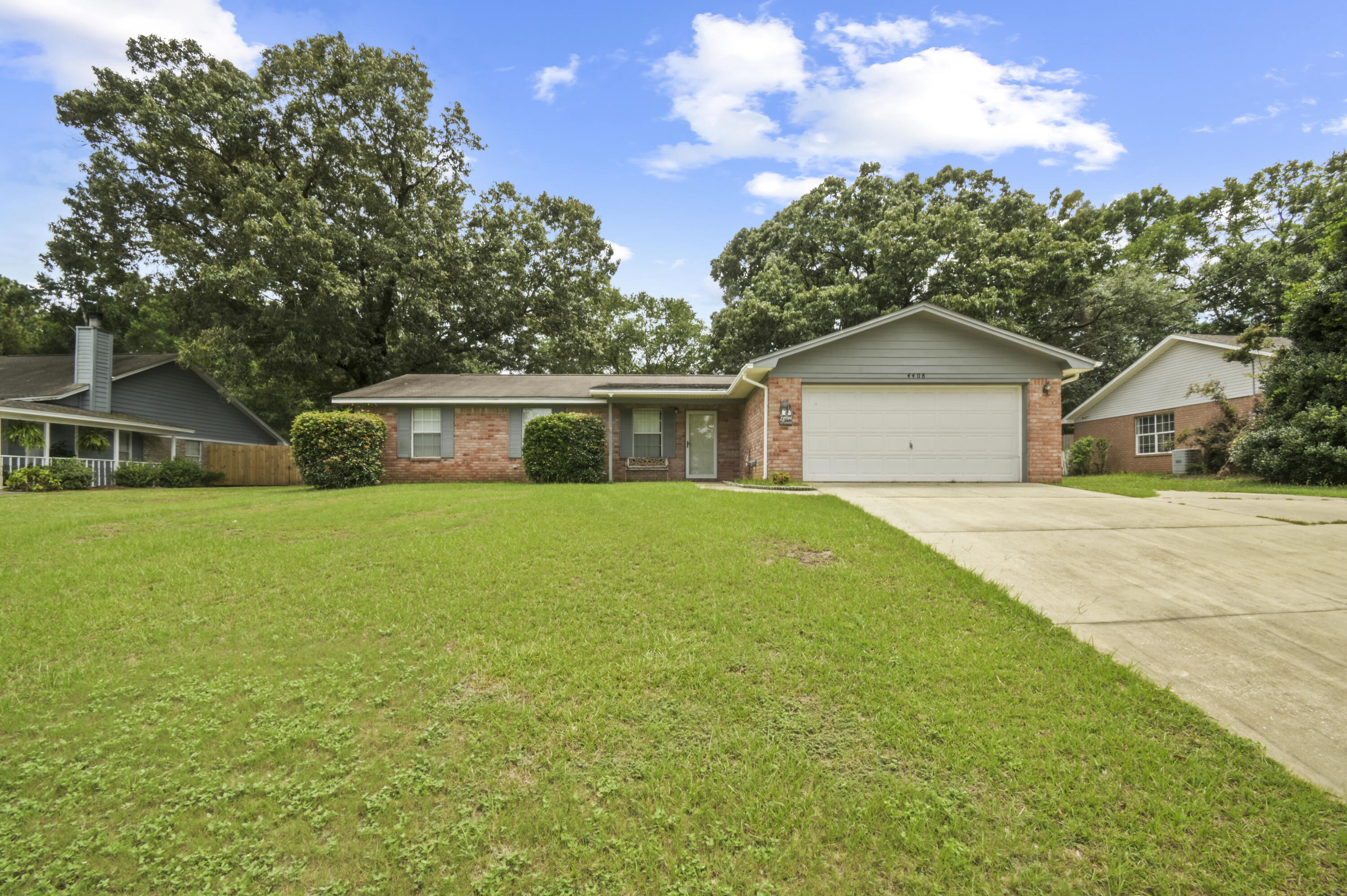 This custom-built home has been lovingly maintained by the original owner for over 30 years and is ready for new memories! Pulling up to the home, the curb appeal is immediately apparent. Not only does this property have a 4-car driveway and 2-car garage but it also offers an additional covered concrete slab for boat/RV parking along the side. Stepping inside, you are greeted by the spacious living room that is seamlessly connected to the kitchen/dining area, all with an abundance of natural light. The kitchen is a chefs dream with a peninsula, plenty of storage, and seemingly unlimited counter space. The split floorplan ensures privacy, with the master on the right side of the house and the additional bedrooms on the left. The guest bedrooms are massive with more than enough space for a complete king bed set. The master is even more impressive in size with a walk-in closet and en-suite bathroom to complete the package. The backyard is the crown jewel of this property. Step out into the enclosed 200sqft sunroom with a cup of coffee in the morning, or take on a project in the 650sqft workshop - complete with electricity! Theres the option of converting the workshop into an ADU or in-law suite, with additional parking under a second carport behind the privacy fenced back yard. Stop by and make this house your home!