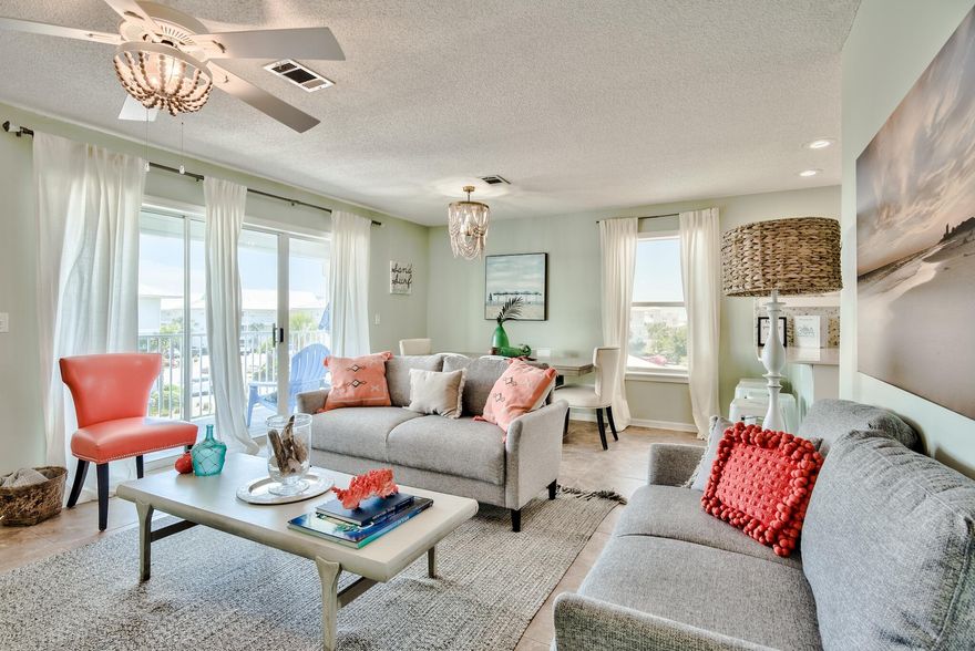Incredible top floor corner unit in the newly renovated Beachside Villas south of 30A. Recently updated and newly decorated, this 3 bedroom, 2 bathroom unit offers a direct corner view over the seasonally heated pool and lake views from the back. The owners have upgraded the flooring and installed new finishes in each bathroom and the kitchen. The condo boasts a large balcony which you can access from the main living area as well as the master bedroom. Fully furnished and rental ready, unit 931 has a proven track record and is a top income earner. The complex of Beachside Villas offers 2 pools (1 heated in the off season), tennis courts, shuffleboard, docks with lake views and fishing. Eastern Lake is right outside for your paddle boarding and scenic views!