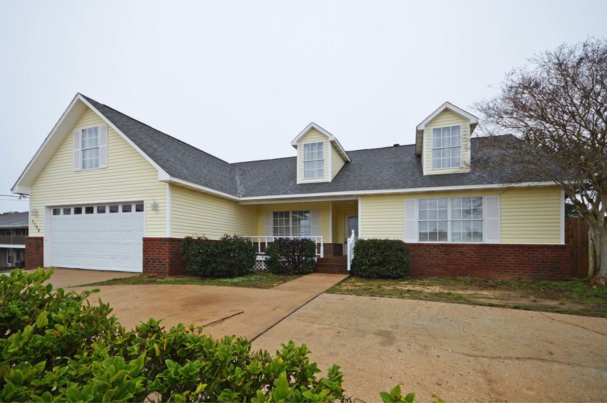 Charming Home in Gulf Breeze; Overlooking Tiger Point West Golf Course. This Three bedroom, Two bathroom home features: an eat-in kitchen with breakfast bar, ​large ​kitchen pantry, and a split floor plan. The master ​suite​ offers a trey ceiling and the master bathroom including double vanity, walk-in​ shower a large walk-in closet and a private water closet. Call today for a private showing!